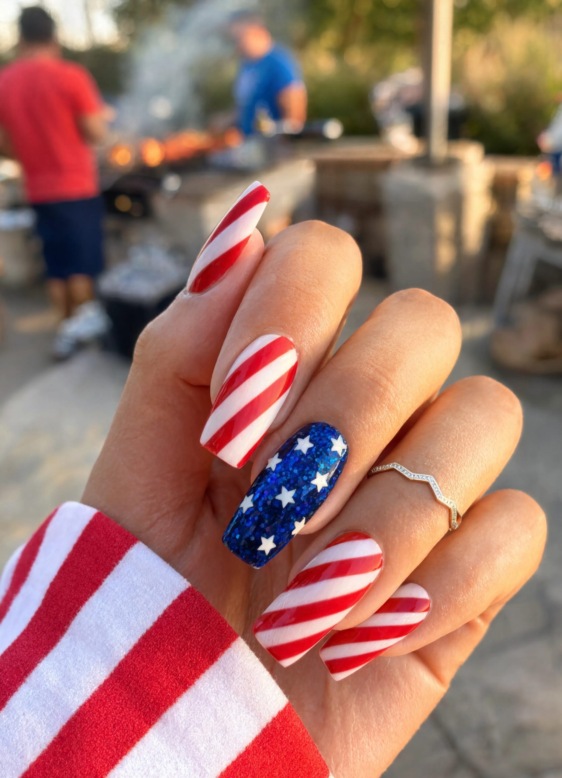 Candy stripes with navy glitter stars - July Nail Designs