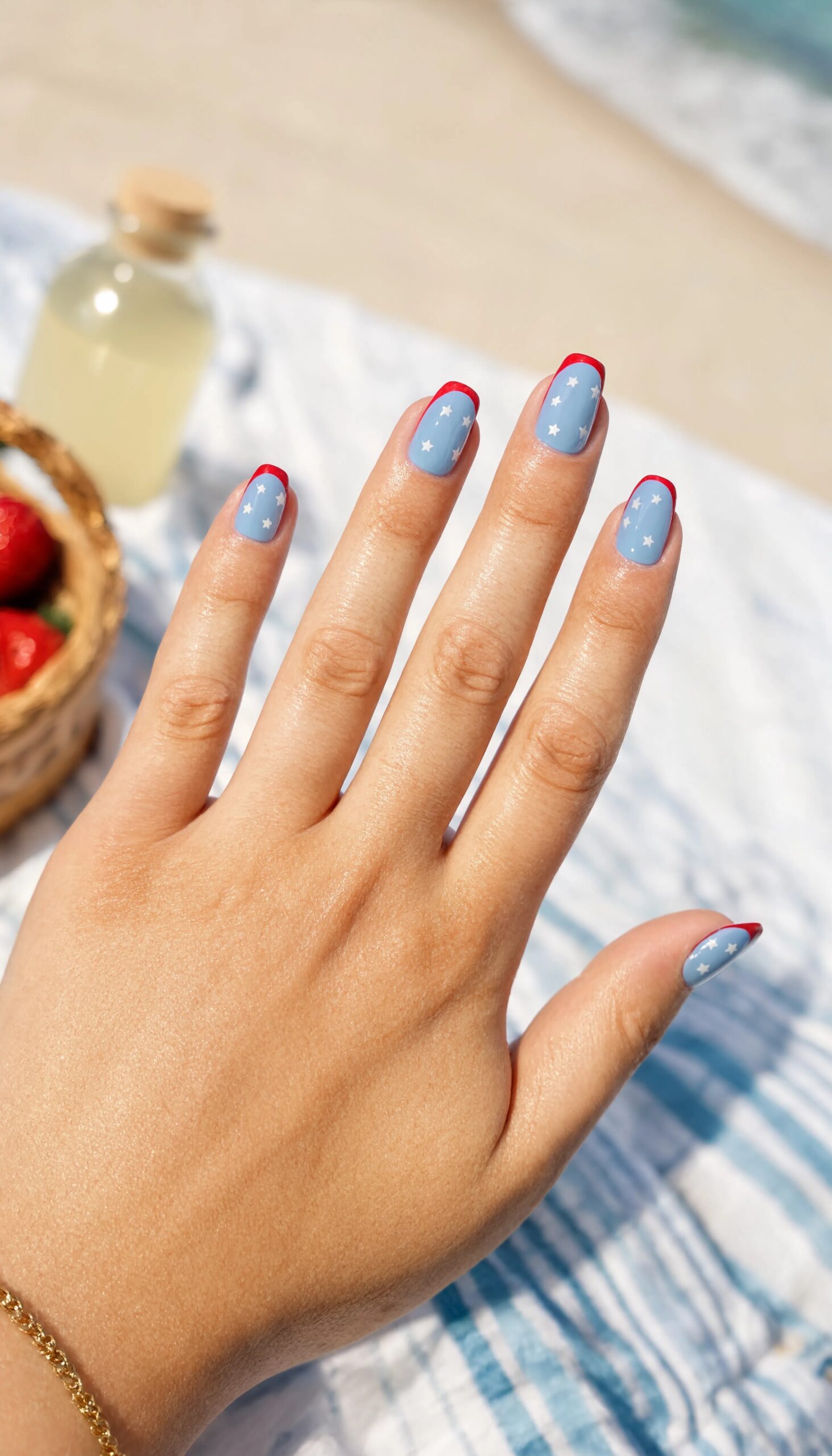 Powder blue with white stars and red micro tips - July Nail Designs